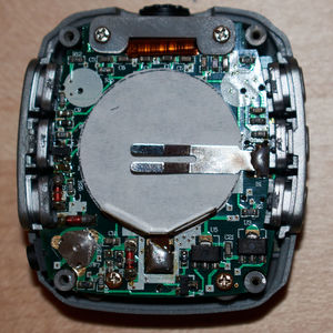 Circuit board with coin cell holder and various surface mount components
