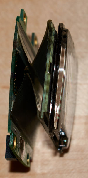 Stackup of two circuit boards connected by two flat ribbon cables